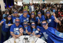 69 organizations recognized as PBN’s Best Places to Work in festive atmosphere CAREY, RICHMOND & VIKING INSURANCE employees dress up as superheroes Wednesday during Providence Business News' 2022 Best Places to Work awards event. / PBN PHOTO/MIKE SKORSKI