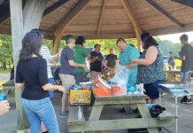 Envision Technology Advisors LLC BIG SPREAD: Envision Technology Advisors LLC employees gather for a recent company picnic.
COURTESY ENVISION TECHNOLOGY ADVISORS LLC
