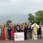 THE 2022 HONOREES of Providence Business News' 40 Under Forty Awards program pose during Thursday's event at Aldrich Mansion in Warwick. / PBN PHOTO/MIKE SKORSKI