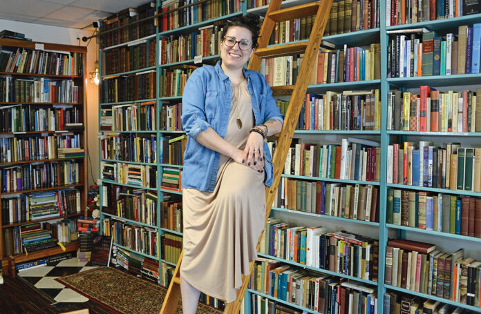 FROM PASSION TO PROFESSION: Kelly Allen-Kujawski used her love of reading to launch Rarities Books & Bindery in South Kingstown, where she specializes in restoration and preservation services for antique books and documents.
PBN PHOTO/ELIZABETH GRAHAM FROM PASSION TO PROFESSION: Kelly Allen-Kujawski used her love of reading to launch Rarities Books & Bindery in South Kingstown, where she specializes in restoration and preservation services for antique books and documents.
PBN PHOTO/ELIZABETH GRAHAM