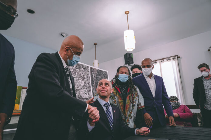 THE PROVIDENCE MUNICIPAL Reparations Commission on Monday approved a final report outlining a plan for racial reparations. Pictured is Mayor Jorge O. Elorza (center) announcing the executive order to create the commission./ COURTESY CITY OF PROVIDENCE