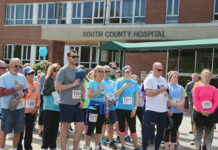 New wellness initiatives target physical, mental well-being at South County Health ON YOUR MARKS: South County Health employees assemble in front of South County Hospital in South Kingstown as they prepare to begin the South County Health Centennial 5K in May 2019.
COURTESY SOUTH COUNTY HEALTH