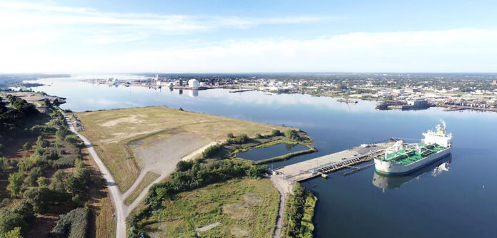 CITY, STATE AND FEDERAL officials gathered on Monday to mark the groundbreaking to the South Quay Marine Terminal along the East Providence waterfront, which will serve as a shipping and staging hub for the offshore wind industry. /COURTESY RI WATERFRONT ENTERPRISES LLC