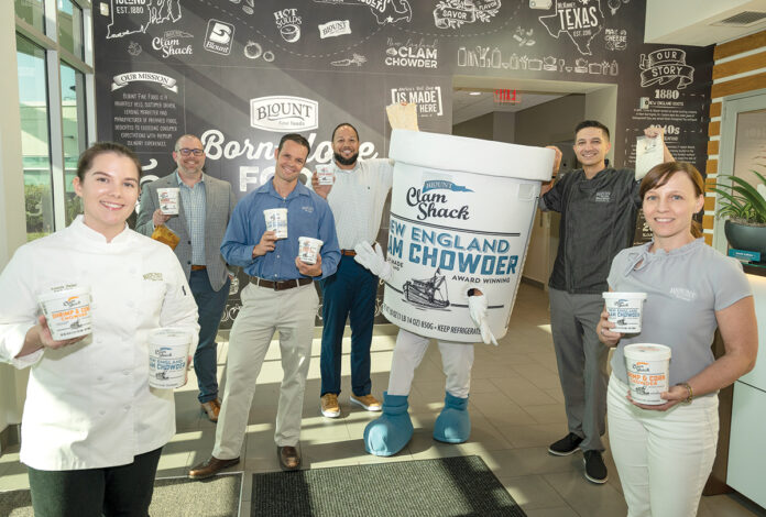 SOUPED UP: Blount Fine Foods Corp. employees, from left, Amanda Hadad, Nathan Hayden, Marques Irving, William Bigelow, Thomas Gervasi and Robin Leatherwood show off the company’s Clam Shack soup line. PBN PHOTO/DAVID HANSEN