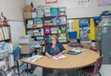 A financial remedy for R.I.’s aging schools CRAMPED CLASSROOM: Thornton Elementary School Principal Louise Denham sits in one of the school’s cramped classrooms. The building is more than 100 years old and is part of a plan to consolidate all four elementary schools in Johnston using a voter-approved $215 million school construction bond.
PBN PHOTO/MICHAEL SALERNO