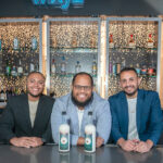 COQUITO CREW: Papis Refrescos LLC co-owners, from left, Travis Escobar, Victor Regino and Lewis Olmo run one of the only companies in Rhode Island making and selling coquito.  PBN PHOTO/MICHAEL SALERNO