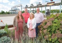 CLEAR LANE: The R.I. Turnpike and Bridge Authority implemented new technology to collect bridge tolls more efficiently. Pictured, from left, are R.I. Bridge and Turnpike Authority Director of Tolling Katie Coleman, Chief Financial Officer Jeff Goular, Executive Director Lori Caron Silveira and Director of Engineering Eric Seabury.  PBN PHOTO/DAVID HANSEN