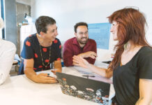 DESIGNxRI builds an industry by design COLLABORATIVE EFFORT: From left, DESIGNxRI Executive Director Ellie Brown, Program and Events Manager Davin Samuels and marketing associate Rue Sakayama at the nonprofit’s Providence office.
PBN PHOTO/RUPERT WHITELEY