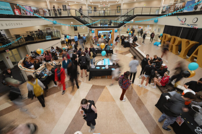 BRYANT UNIVERSITY STUDENTS help with on-campus donations inside the rotunda Wednesday during the university's annual Giving Day. The initiative raised more than $2 million, setting a new record. / COURTESY BRYANT UNIVERSITY BRYANT UNIVERSITY STUDENTS help with on-campus donations inside the rotunda Wednesday during the university's annual Giving Day. The initiative raised more than $2 million, setting a new record. / COURTESY BRYANT UNIVERSITY