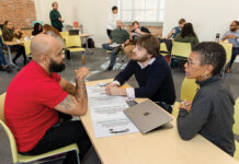 College Unbound offers a pathway that changes lives BUILDING THE FUTURE: College Unbound Director of Admissions Jose Rodriguez, left; co-founder, Provost and President Adam Bush; and Sylvia Spears, vice president for administration and innovation, talk during a work session at the Providence nonprofit.
PBN PHOTO/TRACY JENKINS