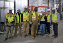 LOCAL IMPACT: Gilbane Inc. has utilized G.O. Services, a subsidiary of Gilbane Building Co., to include local workers on projects and drive economic development. Pictured, from left, working on the Newton Pavilion renovation project in Boston are G.O. Foreman Dan Pattavina, Gilbane Project Safety Manager Mike Morganelli, G.O. laborers Mike Jackson and Darius Hines, Gilbane project engineers Nicole Wormuth and Erica Wentz, and G.O. Vice President and Business Unit Leader Kahlil Olmstead.  COURTESY GILBANE INC.