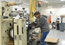 Streamlining efforts helping AstroNova to take flight again ENHANCED OPERATION: Keila Mendez, a machine operator at AstroNova Inc., works at the company’s West Warwick facility. The company, which designs, manufactures, distributes and services data visualization technologies, hired a new director of quality and continuous improvement and implemented new safety measures that have contributed to improved operations.
PBN PHOTO/ELIZABETH GRAHAM