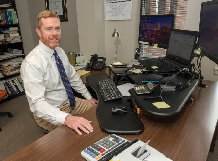 OPPORTUNITY AHEAD? Boyd E. Foster Jr., partner at Feeney, Foster & Cavanagh CPAs LLC, says recommendations by the Federal Accounting Standards Board that would ease tracking the value of cryptocurrency held by businesses may allow his firm to take on corporate clients that have those assets.  PBN PHOTO/MICHAEL SALERNO