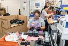 Flexible workers, adaptability keep products churning out at Taco HANDS-ON ASSEMBLY: Taco Inc. machine operators Latsamy Saysana, foreground, and Boumsavanh Le work at the company’s Cranston facility. Taco manufactures a variety of items, including air and dirt separators, circulatory pumps, thermostats and many heating- and pumping-based products.
PBN PHOTO/TRACY JENKINS