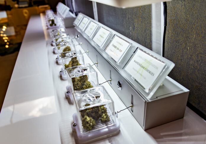 CANNABIS PRODUCTS are on display at Mother Earth Wellness Center in Pawtucket, one of the five Rhode Island locations that started selling recreational marijuana on Dec. 1. PBN PHOTO/MICHAEL SALERNO