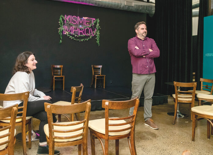 PAYING IT FORWARD: After overcoming anxiety with the help of improv comedy, Taylor Bruneaux, left, and her husband, Luke, are trying to share that transformative experience with others through their Kismet Improv comedy theater in Pawtucket, which offers both live shows and classes. PBN PHOTO/MICHAEL SALERNO