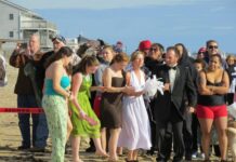 Philanthropy Calendar, Dec. 21, 2022 PARTICIPANTS GET READY to take the plunge at a previous WARM Center Penguin Plunge. The 17th annual plunge will take place Jan. 1 at Windjammer Surf Bar in Westerly. / COURTESY SOUTH COUNTY TOURISM COUNCIL