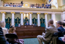 Surplus of question marks: Decisions on tax cuts, housing policies, education aid among matters in the balance RETURN TO THE ROSTRUM: Senate President Dominick J. Ruggerio takes his place at the front of the Senate chambers on Jan. 3, the first day of the 2023 General Assembly session. It’s a position Ruggerio has held since 2017.
PBN PHOTO/MICHAEL SALERNO