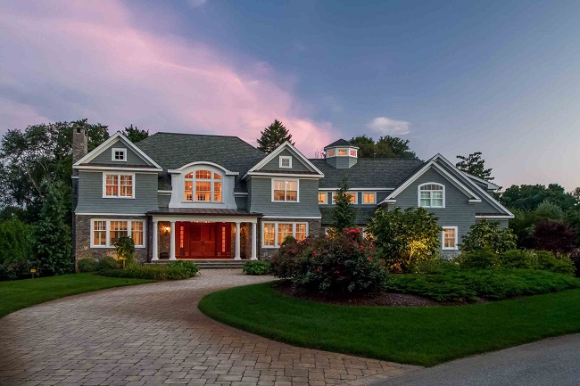 A TWO-STORY HOME at 18 Anchorage Way in Barrington recently sold for $2.4 million in the largest single-family home sale in the town since May 2022. / COURTESY LILA DELMAN COMPASS