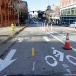 THE CITY OF PROVIDENCE recently received a $27 million federal grant for its urban trail network of protected, two-way bike lanes, such as the one pictured on Empire Street in downtown Providence. However, Mayor Brett Smiley hasn't committed to finishing the network laid out by former Mayor Jorge Elorza, and his administration is still reviewing city infrastructure before deciding how to spend the money. / PBN FILE PHOTO//ELIZABETH GRAHAM
