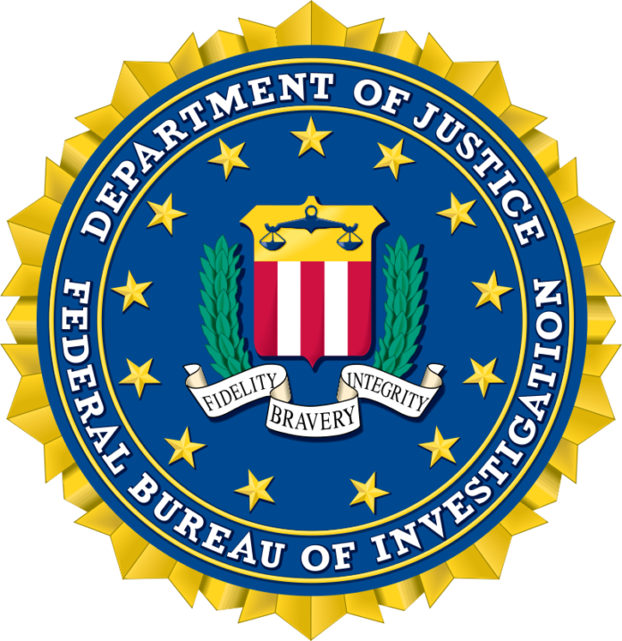 THE FBI executed a court-approved search Thursday at a city business that specializes in catalytic converter recycling, WPRI-TV CBS 12 reported.