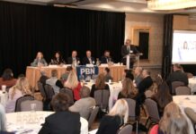 PBN Summit: ‘Human capital is your single greatest investment’ for a strong workplace THE PANEL at Providence Business News' 2023 Workforce Development Summit on Thursday includes, from left, Julie Matthew, Amgen Inc. manufacturing director; Nina Pande, Skills for Rhode Island's Future executive director; Bill Schmiedeknecht, Lifespan Corp. interim senior vice president of human resources and chief human resources officer; Doug Sherman, New England Institute of Technology senior vice president and provost; and Matthew Weldon, R.I. Department of Labor and Training director. Moderating is PBN Editor Michael Mello, standing at right. / PBN PHOTO/MIKE SKORSKI