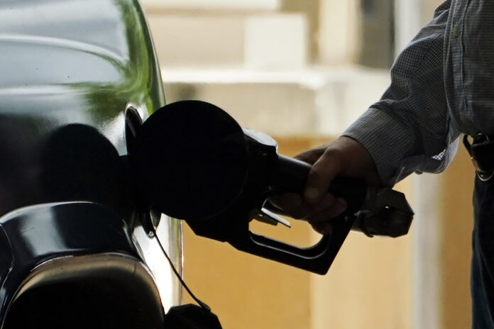 THE AVERAGE PRICE of self-serve, regular unleaded gasoline in Rhode Island increased to $3.27 per gallon, 3 cents higher than last week but 23 cents lower than the national average, according to AAA Northeast. / ASSOCIATED PRESS FILE PHOTO/ROGELIO V. SOLIS