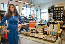 WHAT’S IN STORE? Jo Lee, founder of PopUp Rhody, at a Botanic Providence pop-up retail site organized by her company at Stock ­Culinary Goods on Hope Street in Providence.  PBN FILE PHOTO/ELIZABETH GRAHAM