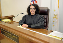 Cooper-Bailey raises the bar in practicing law BREAKING BARRIERS: Angelyne Cooper-Bailey became the first woman of color to serve as an associate judge on the Cranston Municipal Court.
PBN PHOTO/ELIZABETH GRAHAM