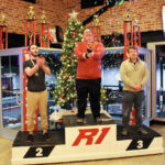 RACE DAY: Brave River Solutions Inc. staffers celebrate after performing well in a go-kart race at R1 Indoor Karting Inc. in Lincoln.  COURTESY BRAVE RIVER SOLUTIONS INC.