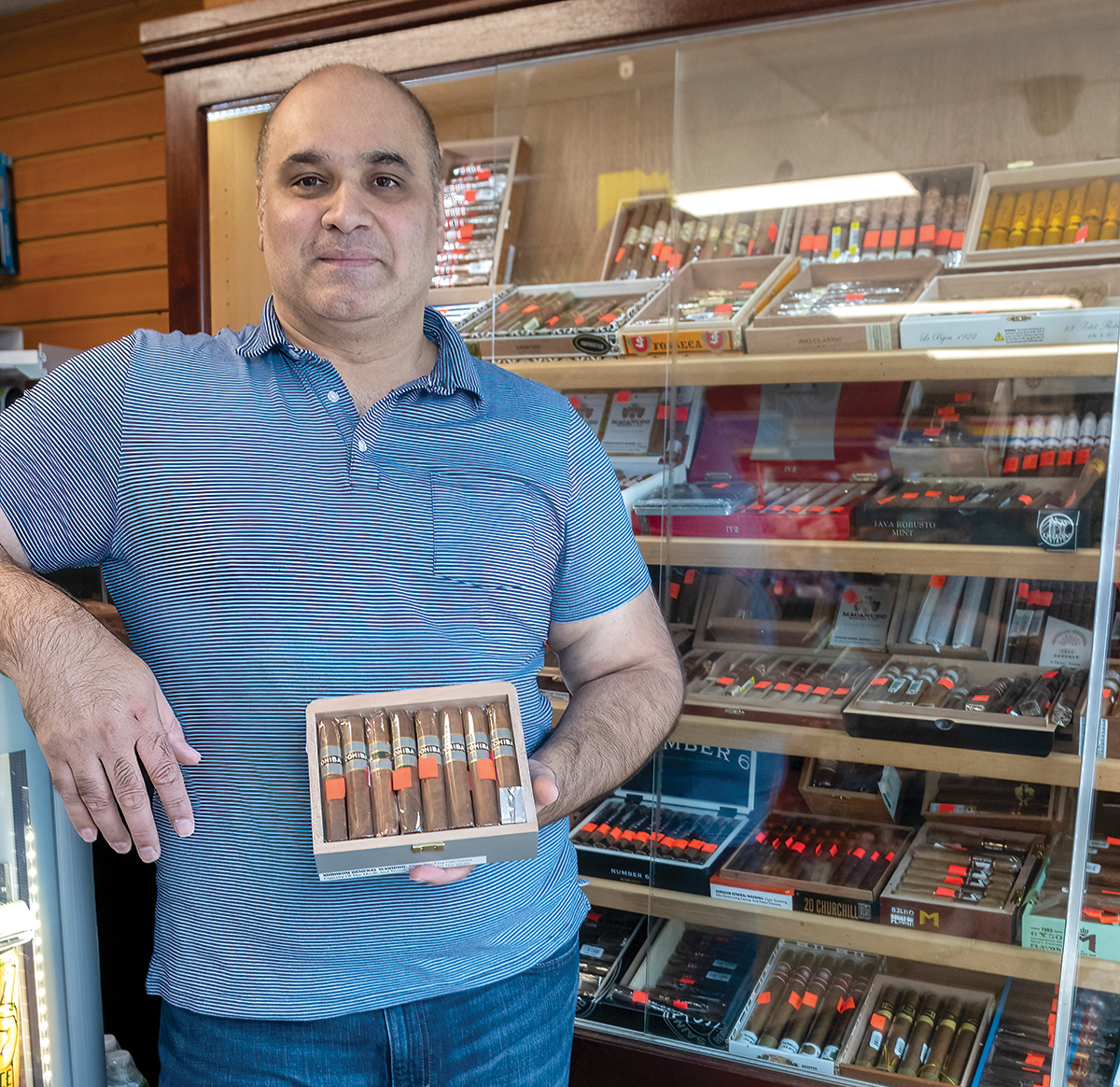 ON A ROLL: Muhammad Choudhry has built BK House of Cigars Inc. into a business that he says has helped him live the American dream after years of struggle.  PBN PHOTO/MICHAEL SALERNO