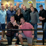 ON THE LANES: Members of the Compass IT Compliance LLC team enjoy a company outing at BreakTime Bowl and Bar in Pawtucket.  COURTESY COMPASS IT COMPLIANCE LLC
