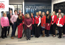 Duffy & Sweeney Ltd. RED ALERT: In February, Duffy & Sweeney Ltd. employees gather to celebrate the firm’s commitment and charitable donation to the American Heart Association by wearing red.
COURTESY DUFFY & SWEENEY LTD.