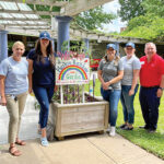 HELPING HASBRO: Falvey Insurance Group employees regularly volunteer with Hasbro Children’s Hospital, and are pictured assisting with the hospital’s Summer Cookout series.  COURTESY FALVEY INSURANCE GROUP