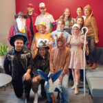 DRESSED FOR SUCCESS: KSA Marketing employees don Halloween costumes at the office.  COURTESY KSA MARKETING