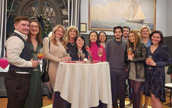 A NIGHT OUT: Marcum LLP staffers gather for a holiday party.  COURTESY MARCUM LLP