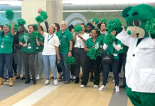 Neighborhood Health Plan of Rhode Island SPIRITED AFFAIR: Neighborhood Health Plan of Rhode Island employees and mascot Dr. Care Bear get into the spirit at an Employee Appreciation Week pep rally.
COURTESY NEIGHBORHOOD HEALTH PLAN OF RHODE ISLAND