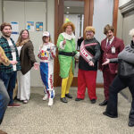 GOOD “WILL”: Employees at Partridge Snow & Hahn LLP hold a Will Ferrell-themed Halloween party last October.  COURTESY PARTRIDGE SNOW & HAHN LLP