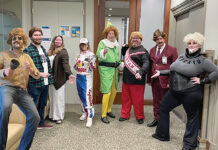 Partridge Snow & Hahn LLP GOOD “WILL”: Employees at Partridge Snow & Hahn LLP hold a Will Ferrell-themed Halloween party last October.
COURTESY PARTRIDGE SNOW & HAHN LLP