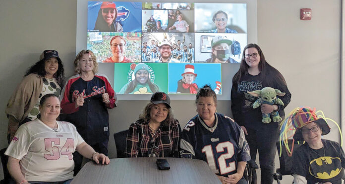 SHOWING SOME SPIRIT: Rhode Island Parent Information Network Inc. employees dress in sporting attire both in the office and virtually.
COURTESY RHODE ISLAND PARENT INFORMATION NETWORK INC. SHOWING SOME SPIRIT: Rhode Island Parent Information Network Inc. employees dress in sporting attire both in the office and virtually.
COURTESY RHODE ISLAND PARENT INFORMATION NETWORK INC.