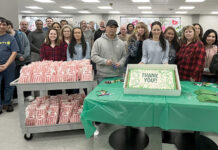 Swarovski Optik North America Ltd. SWEET CELEBRATION: Staffers at Swarovski Optik North America Ltd. gather for snacks and cake for its Employee Appreciation Day.
COURTESY SWAROVSKI OPTIK NORTH AMERICA LTD.