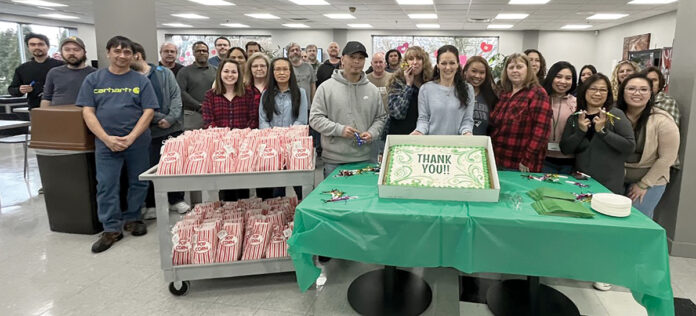 SWEET CELEBRATION: Staffers at Swarovski Optik North America Ltd. gather for snacks and cake for its Employee Appreciation Day.
COURTESY SWAROVSKI OPTIK NORTH AMERICA LTD. SWEET CELEBRATION: Staffers at Swarovski Optik North America Ltd. gather for snacks and cake for its Employee Appreciation Day.
COURTESY SWAROVSKI OPTIK NORTH AMERICA LTD.