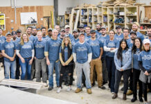 Sweenor Builders Inc. BUILDING THEIR SKILLS: Sweenor Builders Inc. team members pose for a photo after a training session in its custom millwork shop.
COURTESY SWEENOR BUILDERS INC.