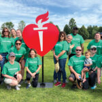 WALKING FOR A CAUSE: Employees from Delta Dental of Rhode Island participate in the American Heart Association’s Heart Walk.  COURTESY DELTA DENTAL OF RHODE ISLAND