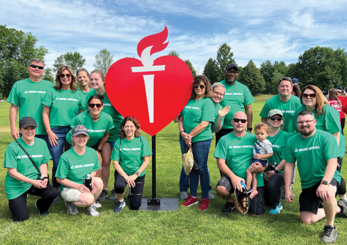 WALKING FOR A CAUSE: Employees from Delta Dental of Rhode Island participate in the American Heart Association’s Heart Walk.  COURTESY DELTA DENTAL OF RHODE ISLAND