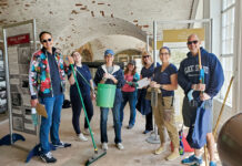 A healthy environment shining brightly at Beacon Mutual Insurance TIDYING THINGS UP: Staffers from The Beacon Mutual Insurance Co. volunteer to clean up Fort Adams State Park in Newport.
COURTESY THE BEACON MUTUAL INSURANCE CO.