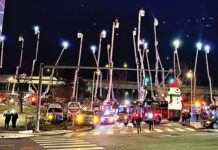 Stanley Tree Services Inc. HOLIDAY LIGHTS: Stanley Tree Service Inc. staffers participate in a Good Night Lights event for Hasbro Children’s Hospital in Providence.
COURTESY STANLEY TREE SERVICE INC.