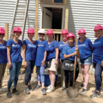 BUILDING A FUTURE: BankNewport employees help construct a home for Habitat for Humanity.  COURTESY BANKNEWPORT