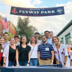 PLAY BALL: Kahn, Litwin, Renza & Co. Ltd. employees visit Fenway Park for a Boston Red Sox game.  COURTESY KAHN, LITWIN, RENZA & CO. LTD.