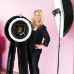 QUICK SHOTS: Olga Enger in her Studio Newport space with her latest addition to her business, the Flash Photobooth. PBN PHOTO/DAVID HANSEN
